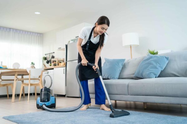 asian-cleaning-service-woman-worker-cleaning-in-living-room-at-home-